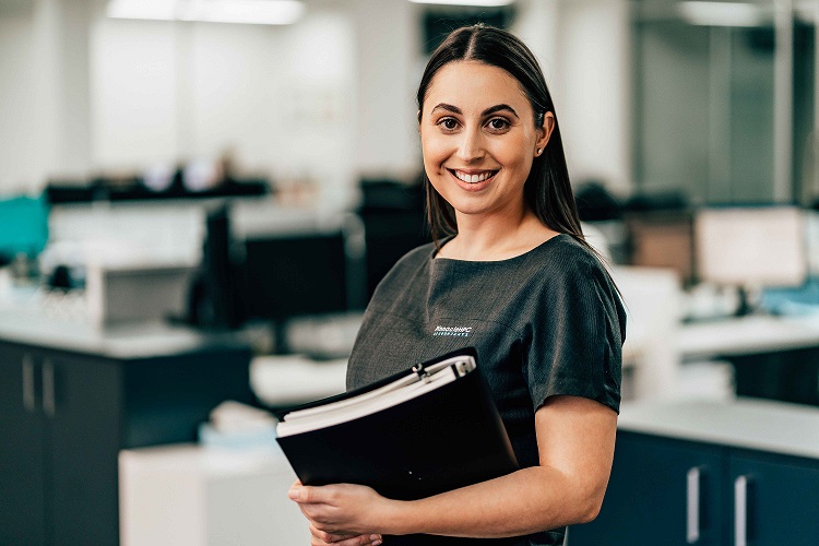 Image of a lady with a folder