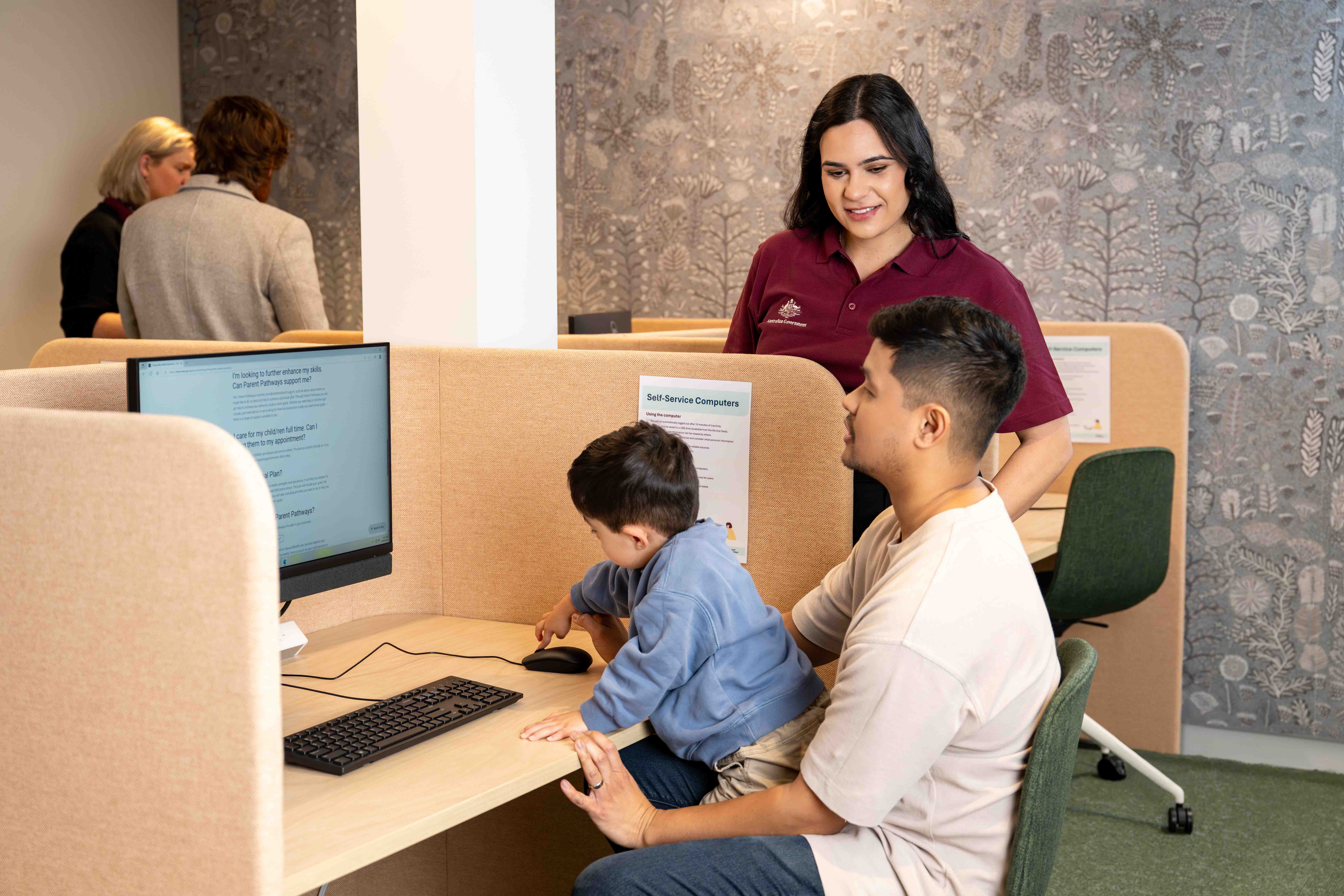 Elizabeth Mitchell (back) is one of 11 mentors supporting parents through the Australian Government service delivery