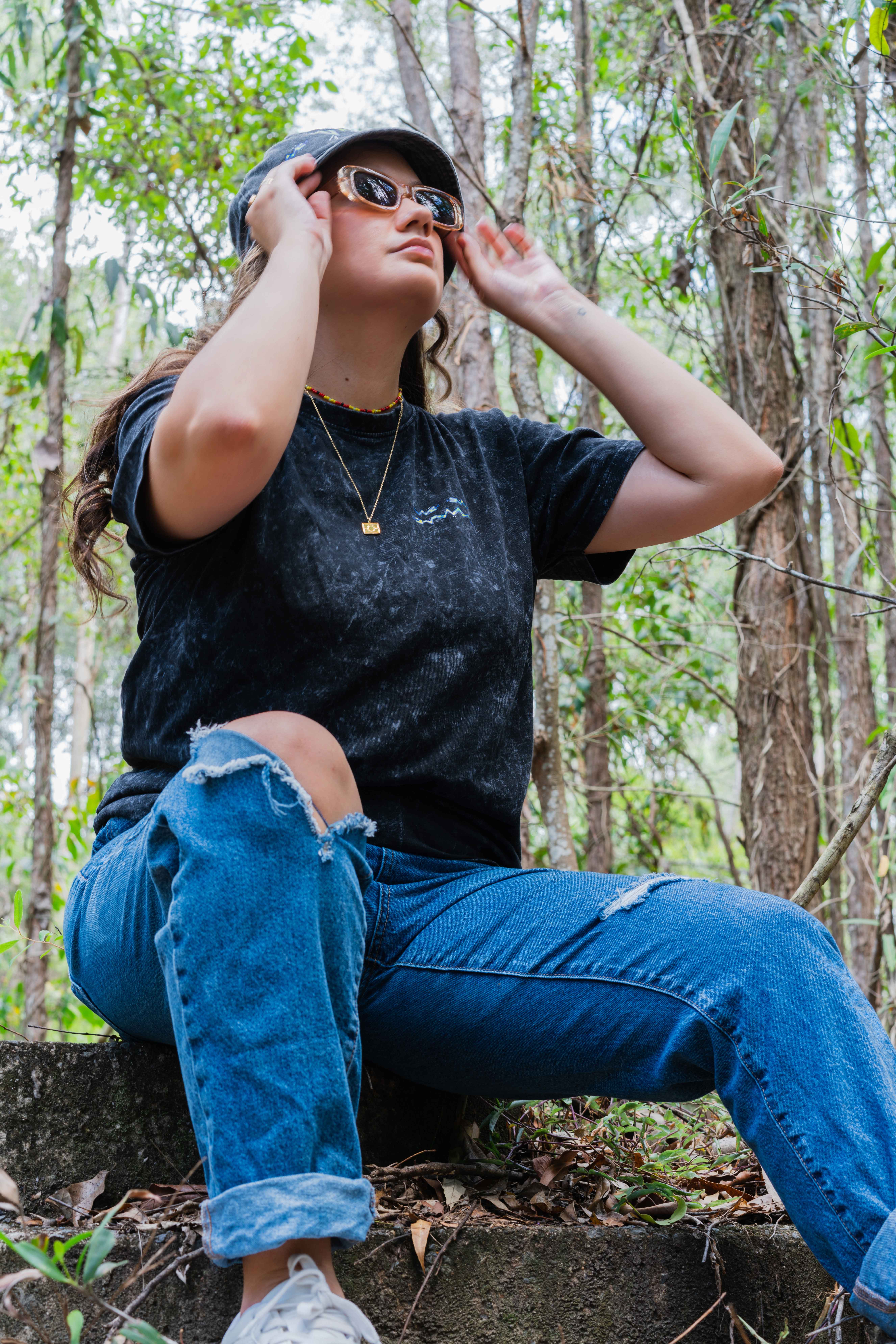 Portrait of Bree Buttenshaw, Kalkadoon artist, known for vibrant digital art celebrating Aboriginal culture