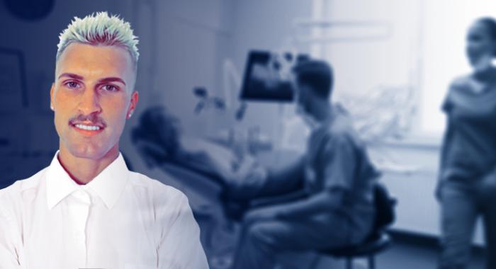Picture of Fred in front of a dental surgery room