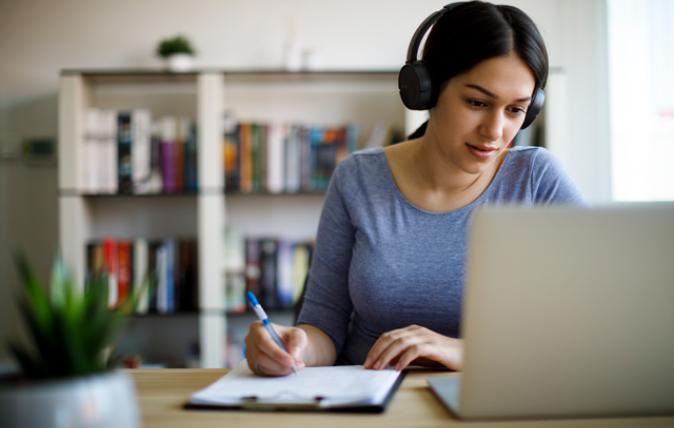 Young woman working from home.