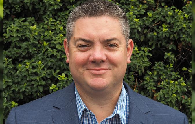 Burnie’s Careers Facilitator Damian Peirce smiles at the camera. 
