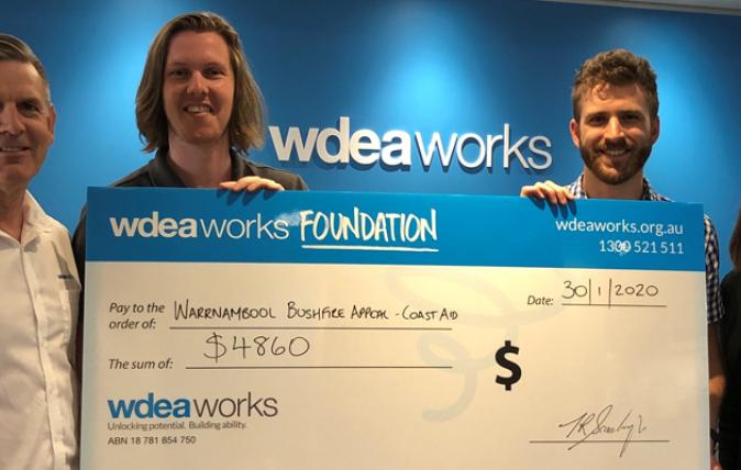 WDEA Works CEO Tom Scarborough, CoastAid Garry Roberts and Tom O’Connor, and WDEA Works Director of Communications and Engagement Andrea Hogan present a fundraising cheque to the Warrnambool bushfire appeal