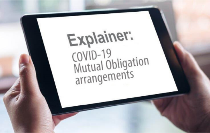 An iPad displaying: Explainer COVID-19 Mutual Obligations