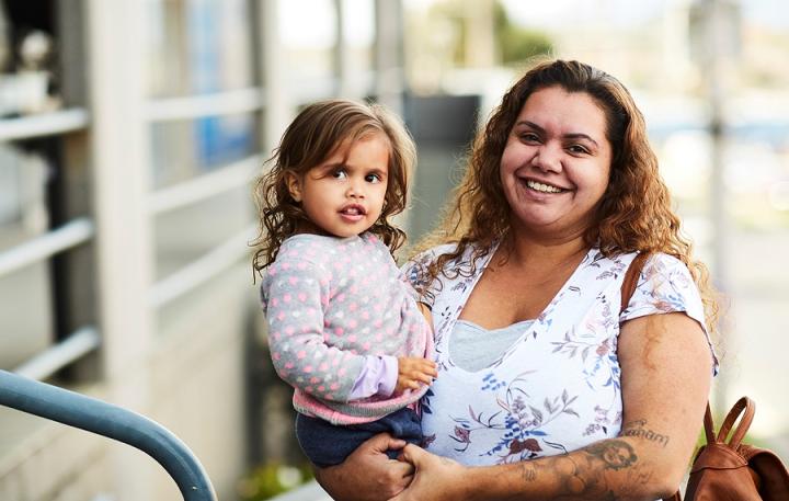 Image of a carer with a child