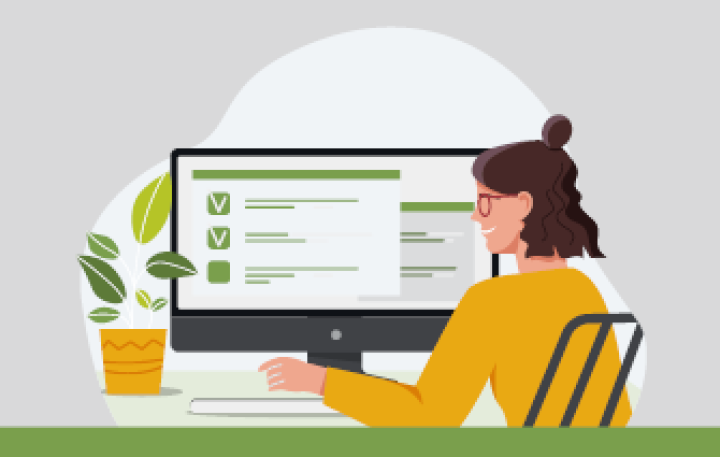 Vector artwork of a seated young woman wearing a mustard-yellow jumper with neck-length brown hair, joyously reading something on a computer screen.