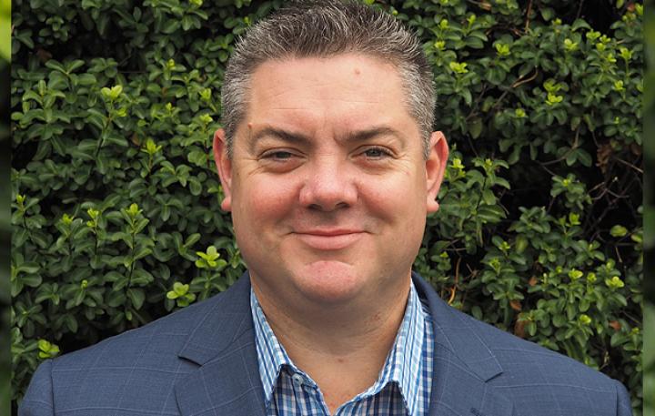 Burnie’s Careers Facilitator Damian Peirce smiles at the camera. 